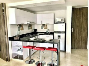 Private kitchen - Exclusive Apartment in Hacienda Peñalisa (Ricaurte)