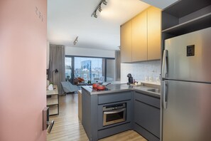 Studio | Cuisine privée | Réfrigérateur, micro-ondes, plaque de cuisson, machine à expresso