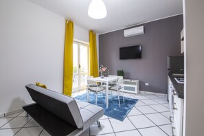 Condo Deluxe | Área de sala de estar