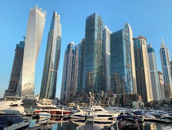 Stunning marina views surround this waterfront property, offering a tranquil atmosphere and easy access to the docked yachts.