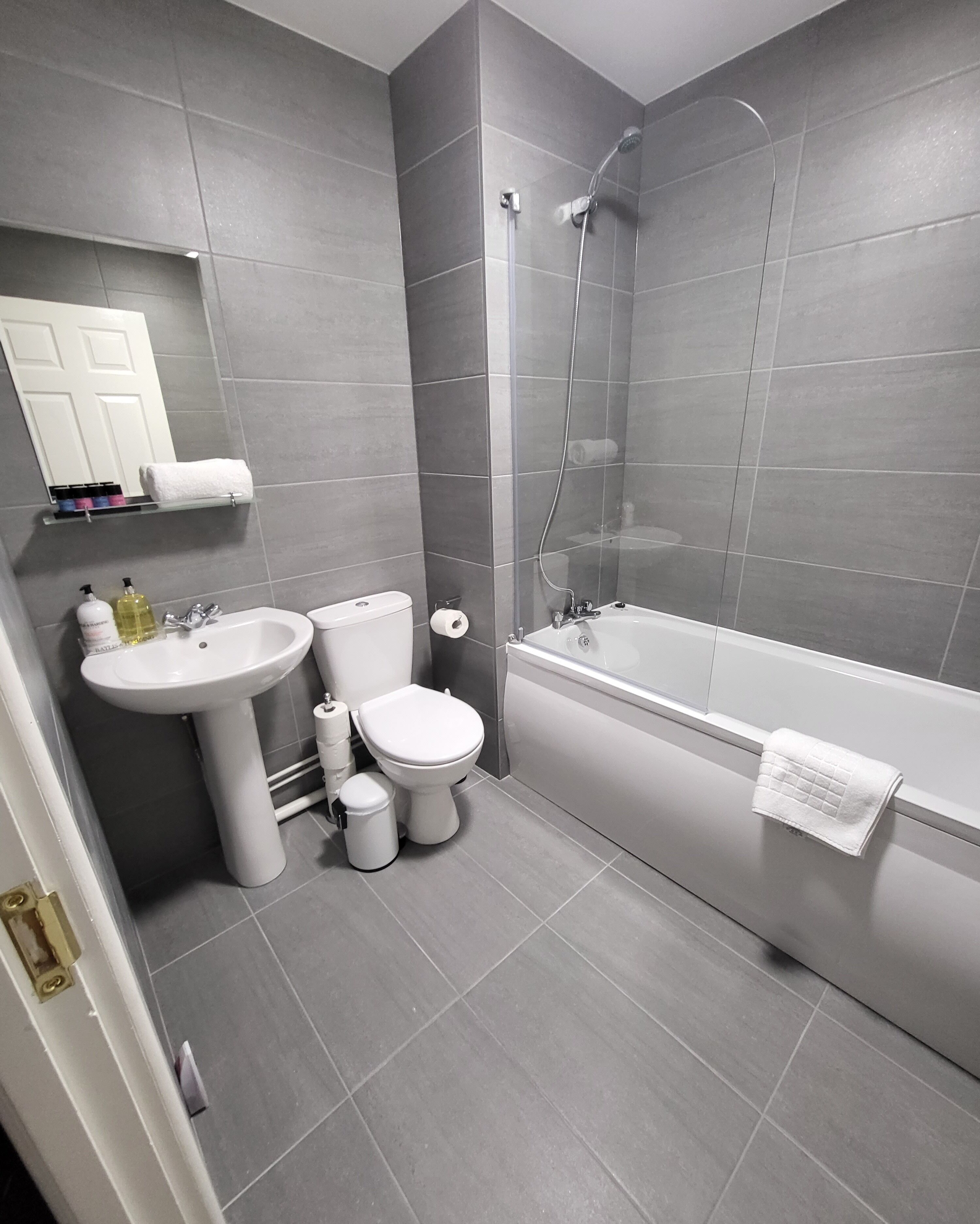 Hair dryer, towels, soap, shampoo