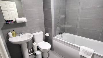 Hair dryer, towels, soap, shampoo