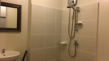 Shower, towels, soap, toilet paper