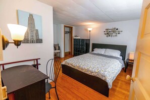 1 bedroom, desk, iron/ironing board, travel crib