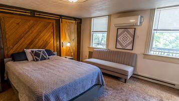 1 bedroom, desk, iron/ironing board, travel crib