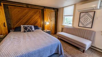 1 bedroom, desk, iron/ironing board, travel crib