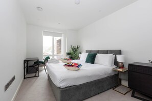 1 dormitorio, tabla de planchar con plancha, Internet y ropa de cama