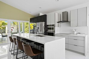 Fridge, microwave, oven, stovetop - Island Oasis • 4BR Home w/ Heated Pool + Jacuzzi (North Bay Village)