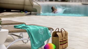 Outdoor pool, open 8:00 AM to 5:00 PM, pool umbrellas
