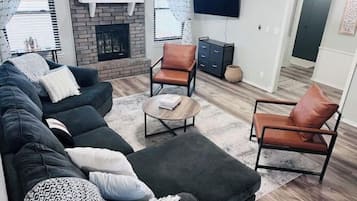 Smart TV, fireplace, books