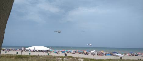 On the beach, sun loungers, beach towels