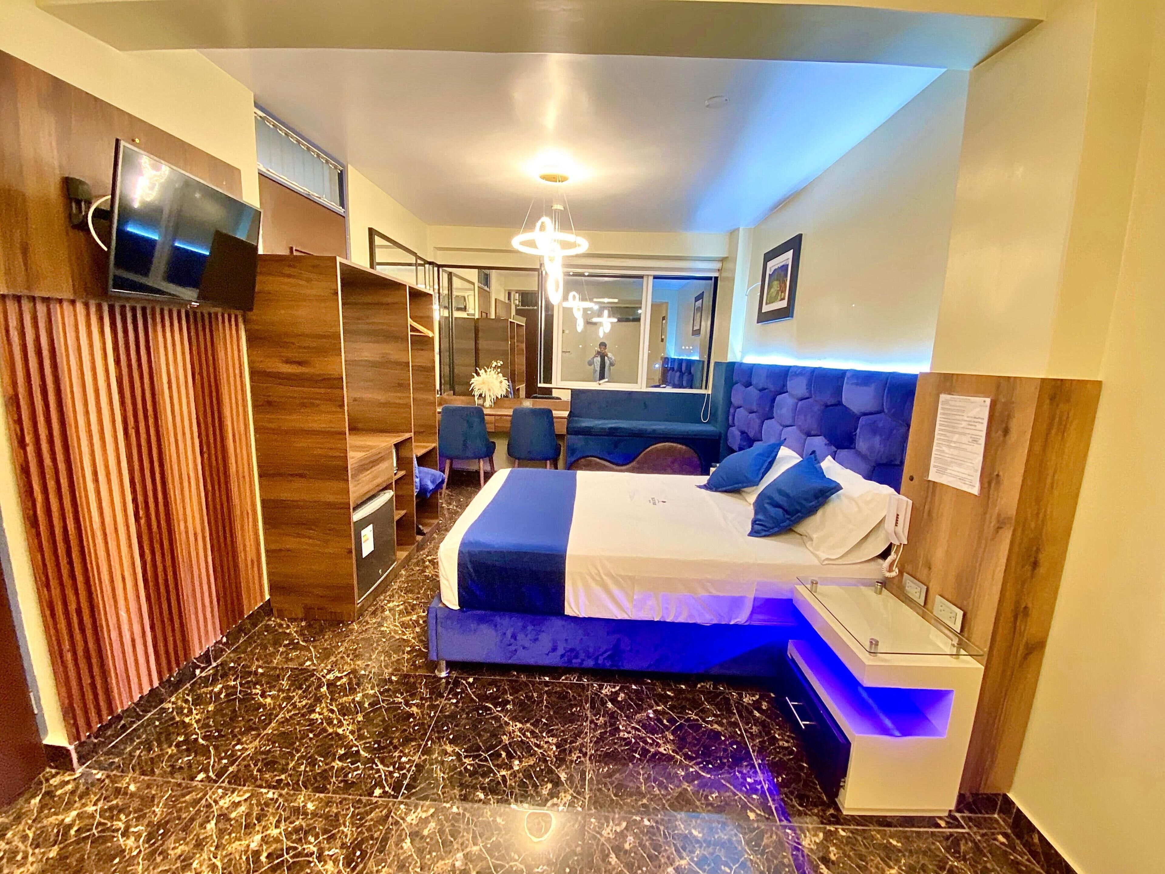 尊荣客房 | 高档床上用品、羽绒被、迷你吧、熨斗/熨衣板