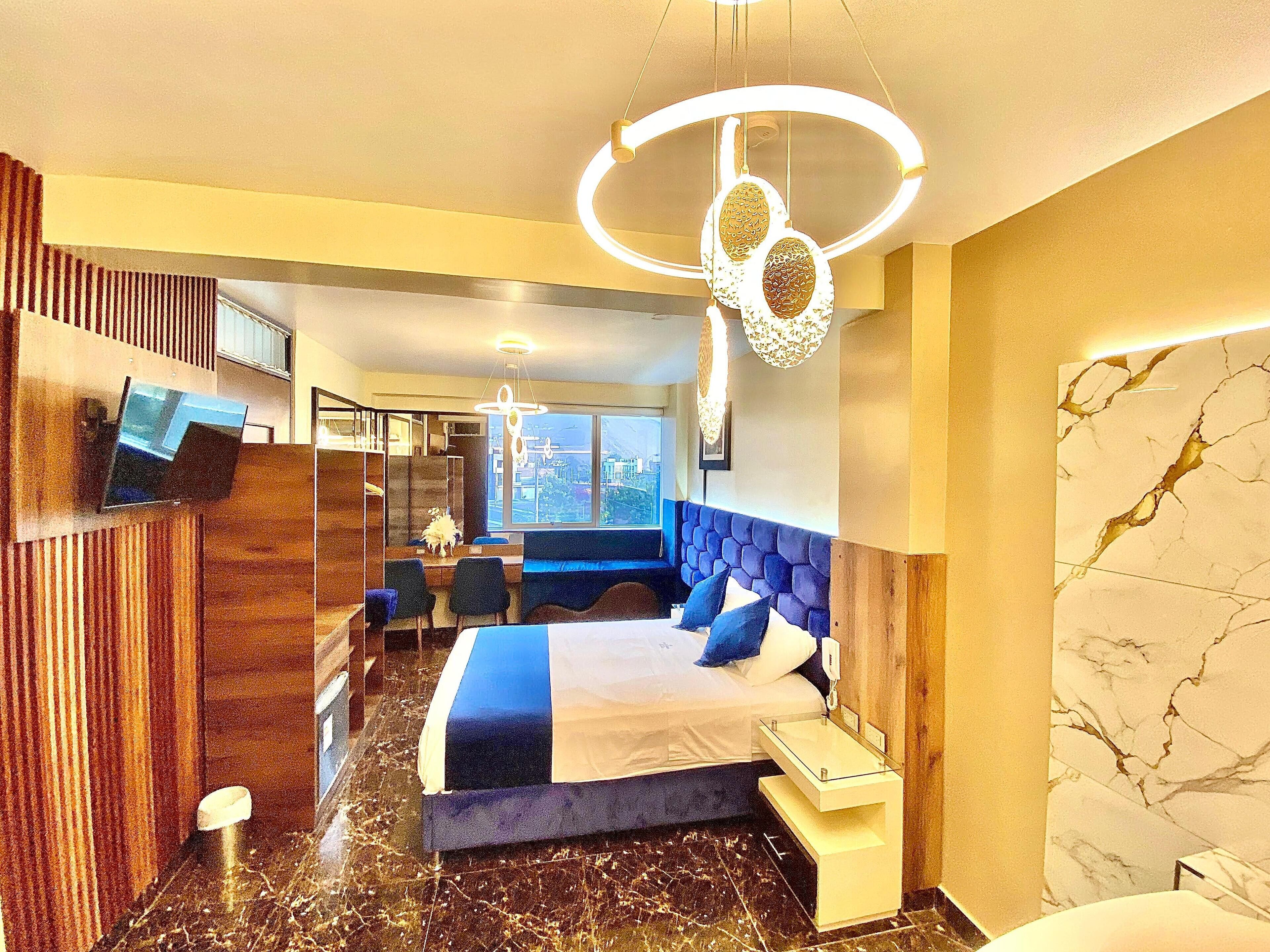 프리미엄룸 | 고급 침구, 오리/거위털 이불, 미니바, 책상