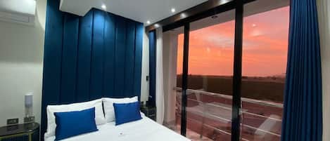 Suite con jacuzzi y balcón