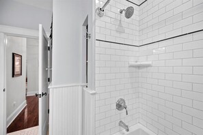 Bathtub, hair dryer, towels