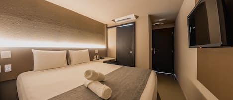 Habitación económica con 1 cama doble o 2 individuales | Wifi gratis y ropa de cama