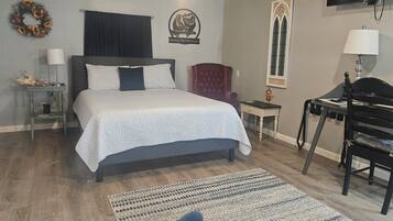 1 bedroom, desk, iron/ironing board, travel crib