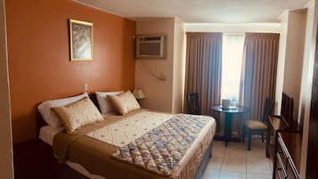 Classic Single Room, 1 Twin Bed, Private Bathroom | Down comforters, desk, blackout drapes, iron/ironing board