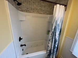 Jetted tub, hair dryer, towels, soap