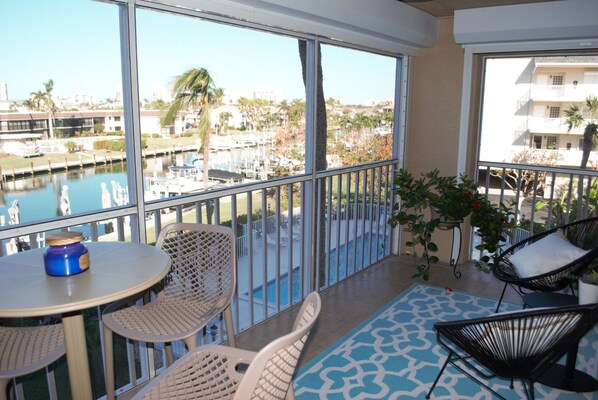Dining - Stylish condo w/ boat lift and a short walk to the beach! (Marco Island)