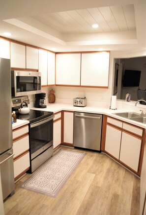 Private kitchen - Stylish condo w/ boat lift and a short walk to the beach! (Marco Island)