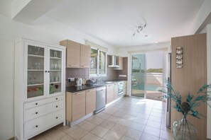 Villa, 3 habitaciones, alberca privada, vista al jardín | Cocina privada