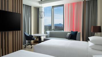 Hypo-allergenic bedding, pillow-top beds, minibar, in-room safe