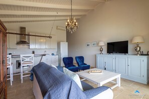 Deluxe-Apartment | Wohnbereich | LCD-Fernseher