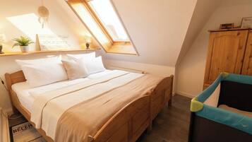 2 bedrooms, desk, iron/ironing board, travel crib