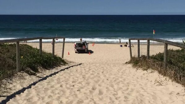 On the beach, beach towels