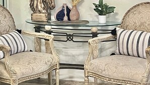 A room with two ornate chairs, a glass coffee table, and a marble wall art piece. - Exclusive Lely Resort House -Private Pool -Sleeps 6 (Naples)