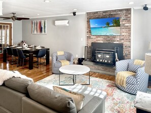Smart TV, fireplace, foosball, books