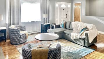 Smart TV, fireplace, foosball, books