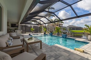 A heated pool - TRUE LUXURY! Brand New Home with Heated Pool, Kayaks. - Villa Luxuria Blanca - Roelens Vacations (Cape Coral)