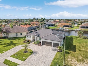 Exterior - TRUE LUXURY! Brand New Home with Heated Pool, Kayaks. - Villa Luxuria Blanca - Roelens Vacations (Cape Coral)