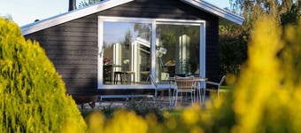 The comfort of this cottage merges with nature