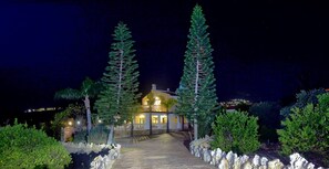 A house with a pathway leading to it, surrounded by trees and a body of water. - Fabulous Villa In Coral Bay Near Beach, Amenities (Peyia)