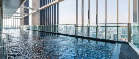 Departamento, 1 habitación, balcón, vista al jardín | Alberca | Alberca al aire libre