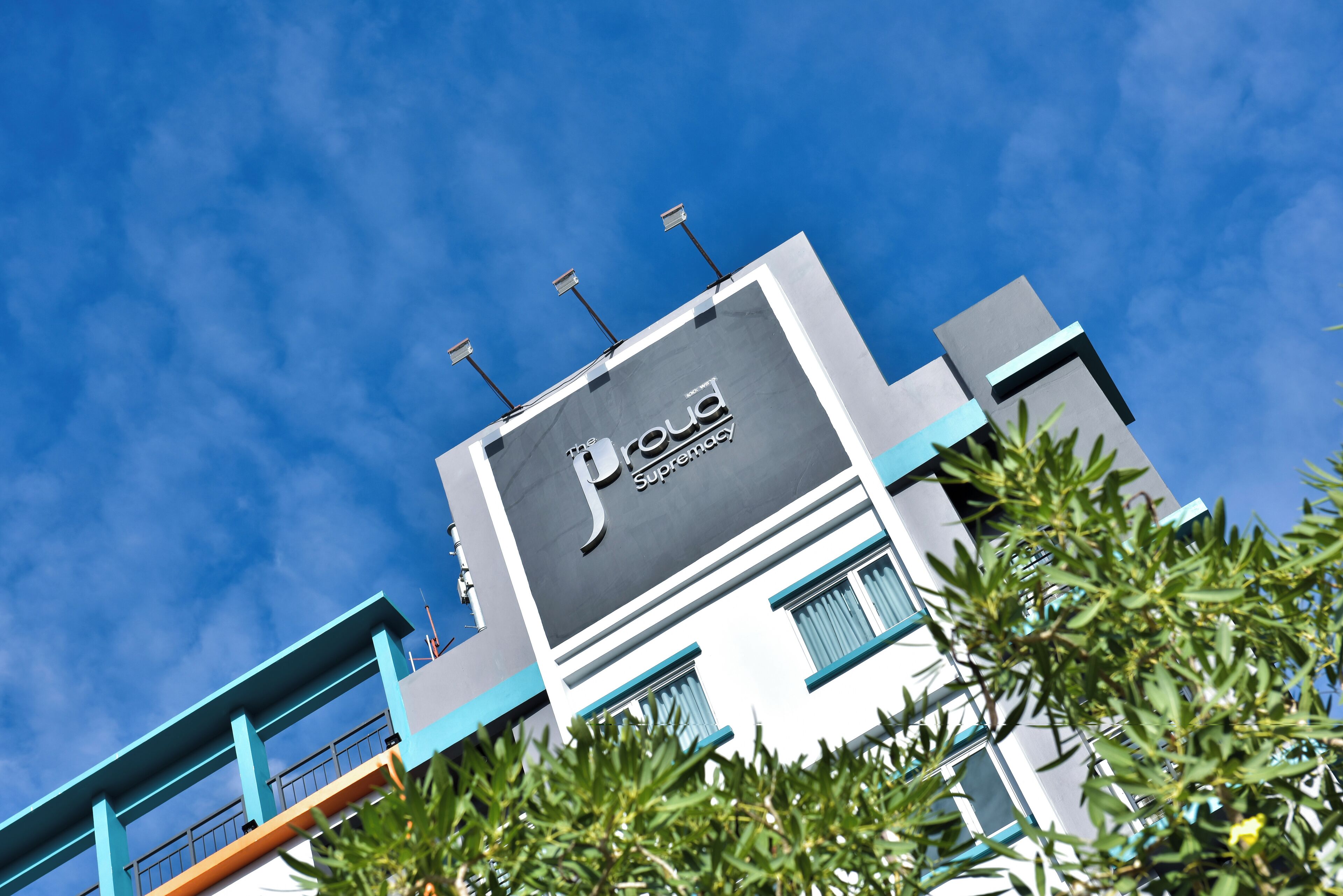 A building with a prominent 'Supreme' logo on the facade.