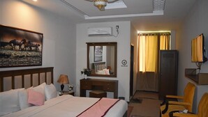 Room | Iron/ironing board (on request) - Abbott Crown Hotel and Restaurant (Abbottabad)
