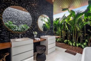 Bathtub, hair dryer, towels