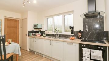 Fridge, dishwasher, electric kettle, cookware/dishes/utensils