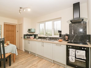 Fridge, dishwasher, electric kettle, cookware/dishes/utensils