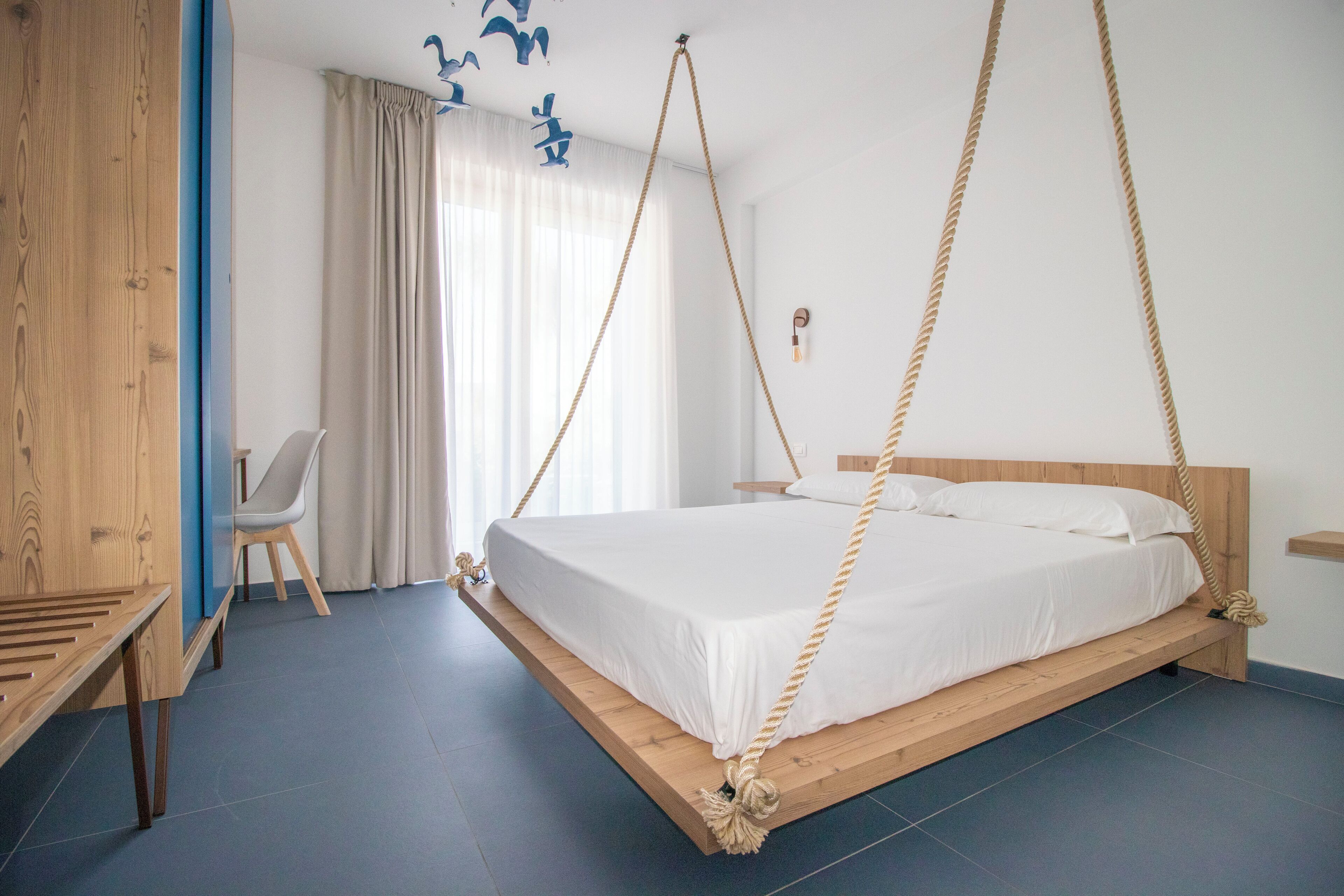 Deluxe Room, 1 King Bed, Garden View, Tower | Minibar, in-room safe, individually decorated, individually furnished