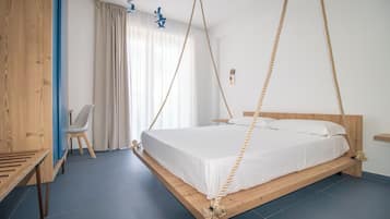 Deluxe Room, 1 King Bed, Garden View, Tower | Minibar, in-room safe, individually decorated, individually furnished