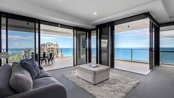 3 Bedroom 2 Bathroom Ocean Sub Penthouse Apartment | Living area | 24-inch flat-screen TV with cable channels