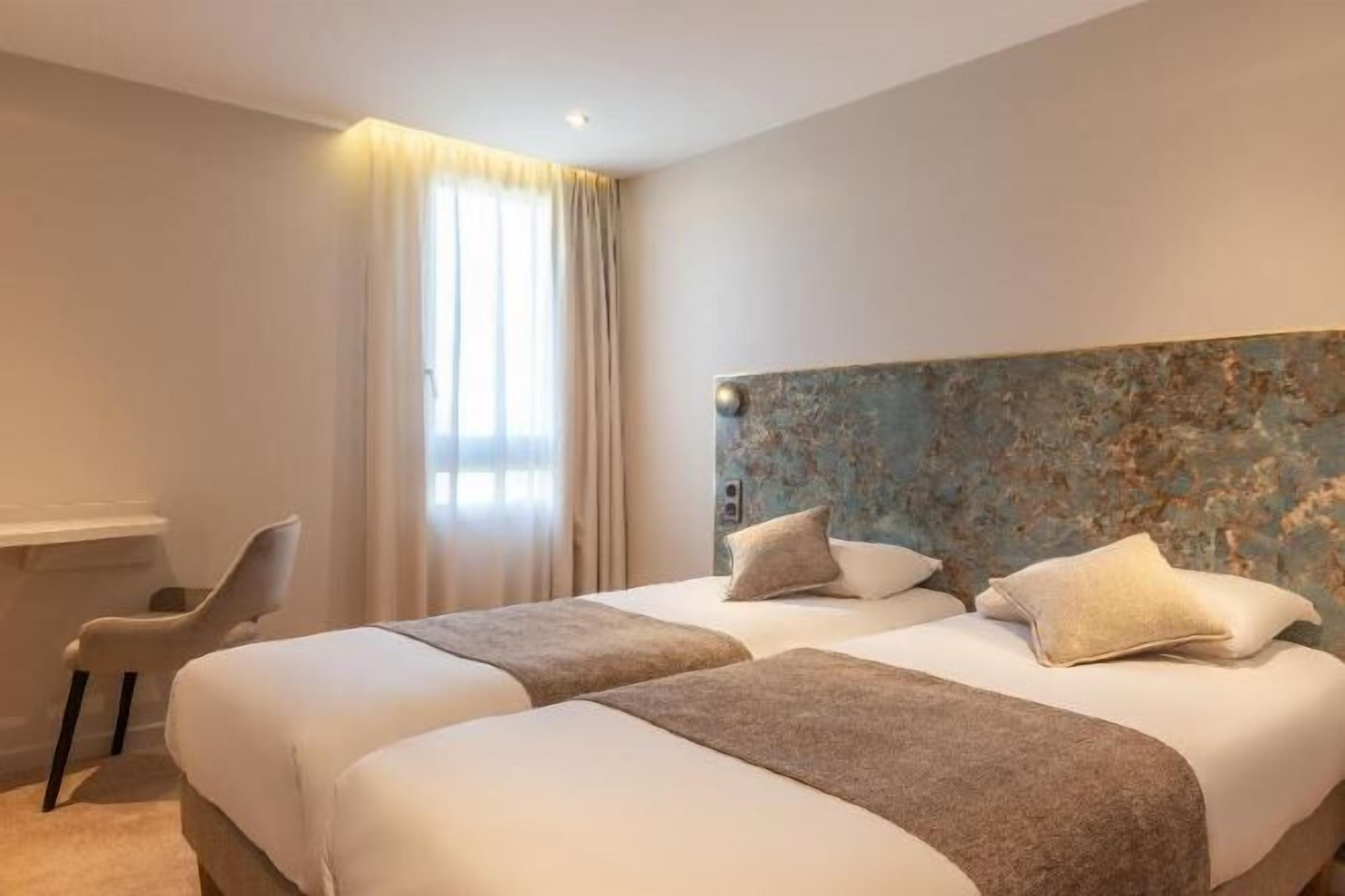 Blackout drapes, iron/ironing board, free WiFi, bed sheets