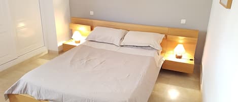 2 bedrooms, in-room safe, iron/ironing board, travel cot