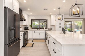 There's plenty of counter space and a double-door fridge for all your groceries. - Modern Oasis|2 Primarys|Pool, Spa & Putting Green (Scottsdale)