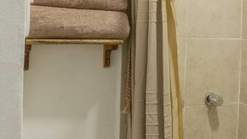 Shower, towels, soap, shampoo